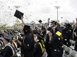 Students celebrate their graduation during ceremony