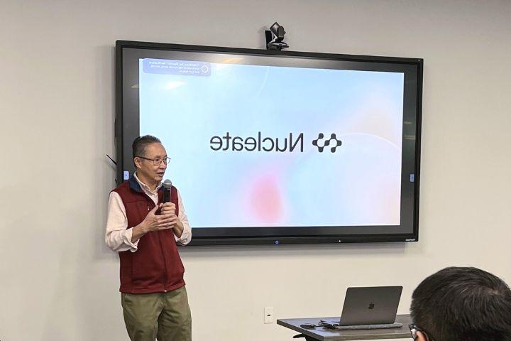 Dr. Howard Xu speaking at Nucleate event