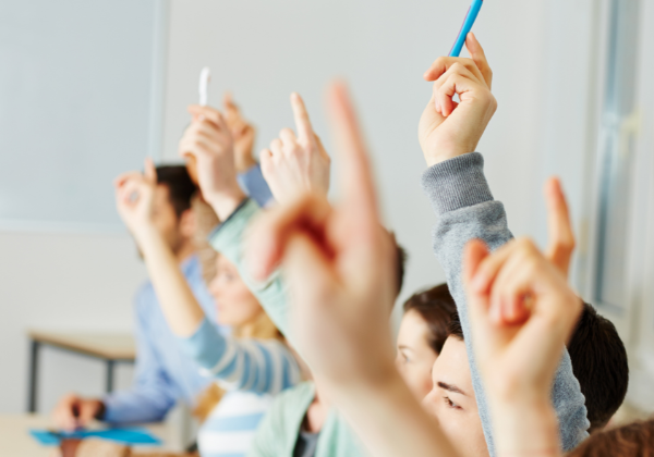 Students raising hands