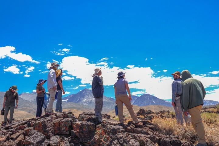 Group of students standing in the desert