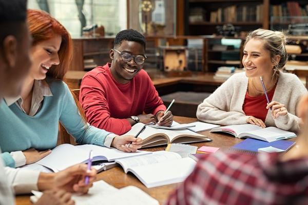 students meeting at table